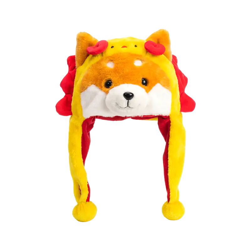 Gul shiba med plyschhatt med röd man